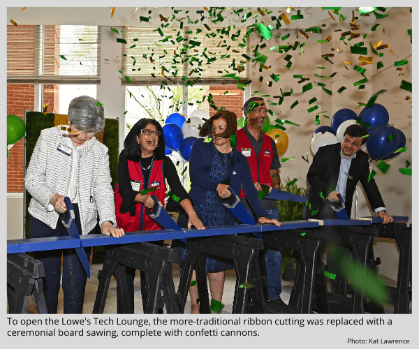 To open the Lowe's Tech Lounge, the more-traditional ribbon cutting was replaced with a ceremonial board sawing complete with confetti cannons.
