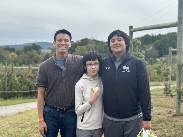 Ethan Nguyen (left) and his two brothers
